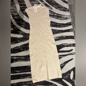 Cream maxi sweater dress with slit in the back size large